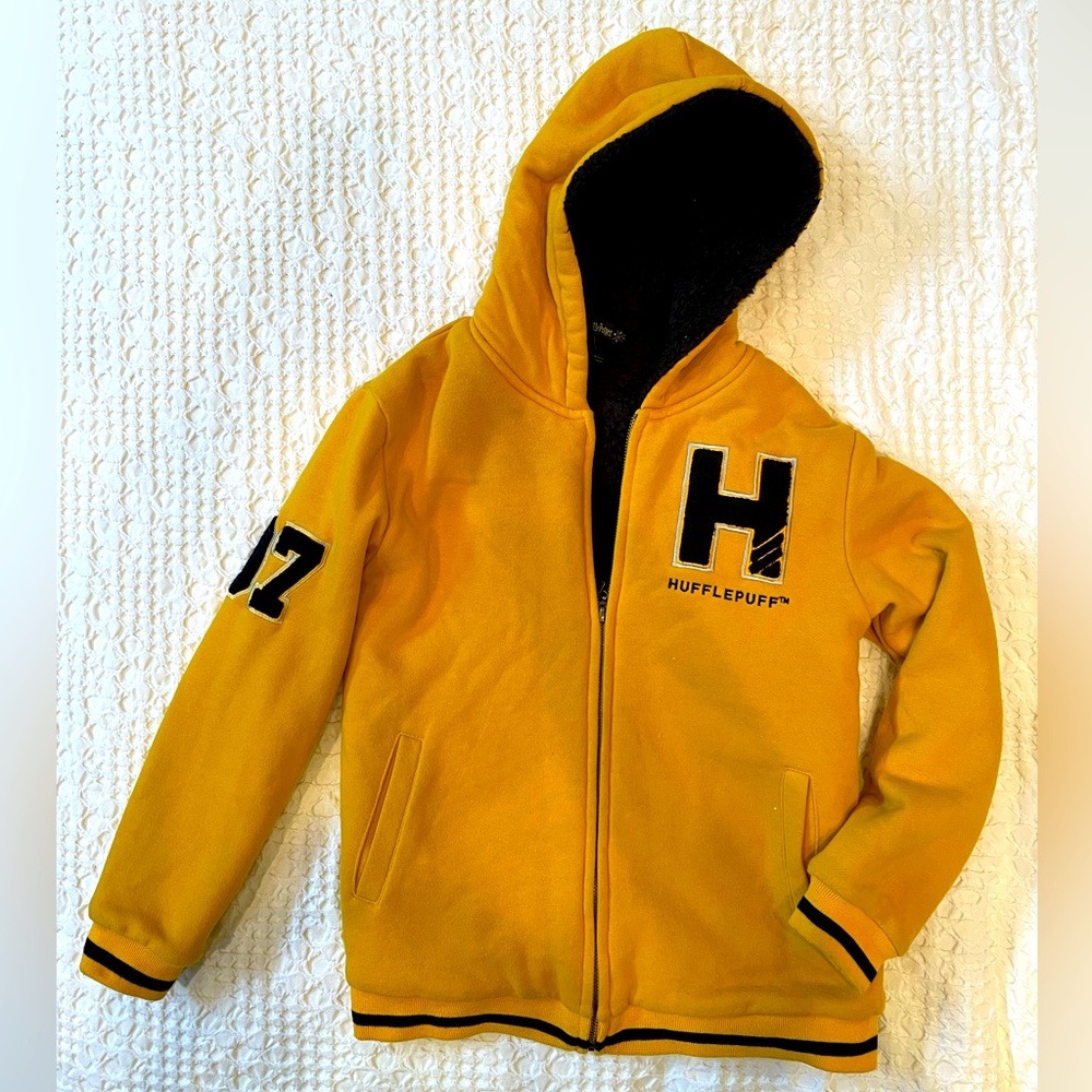 Harry Potter brand Hufflepuff hide fleece lined hoodie. Size 9-10.
